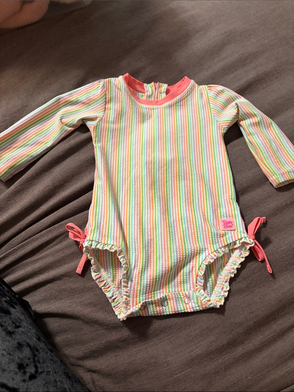Ruffle Butts Pastel Striped Long-Sleeve One-Piece in Coral Accents